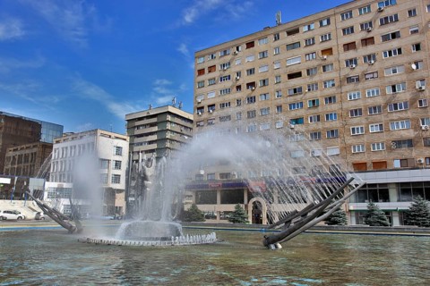 Small Wallachia, city Drobeta Turnu Severin, fountain in front of a building in the city centre,