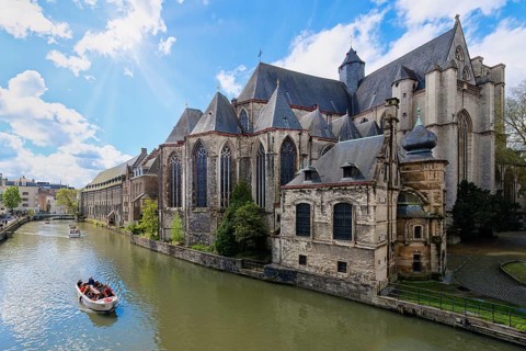 Late gothic Saint Michael Church along the Lys River, Ghent, Flanders, Belgium, Europe