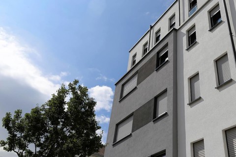 Residential building with modern facade painting (Building with modern facade painting)