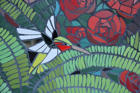 Wall mosaic with hummingbird by Isidora Paz López 2019, one, bird figure, flight, green, flower