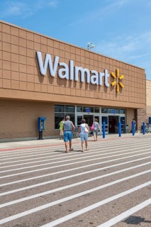 Shoppers entering the Walmart shopping center in Biloxi, Mississippi, USA, North America