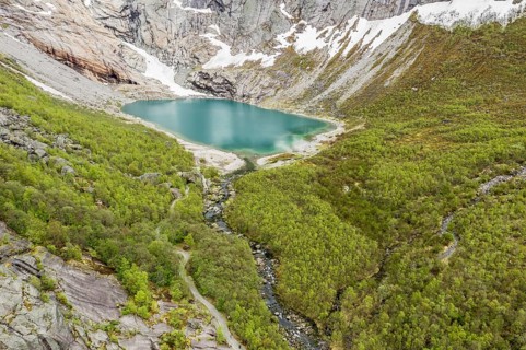 Aerial view of glacier Briksdalsbreen, a glacier tongue of Jostedalsbreen, glacier lake, Norway,
