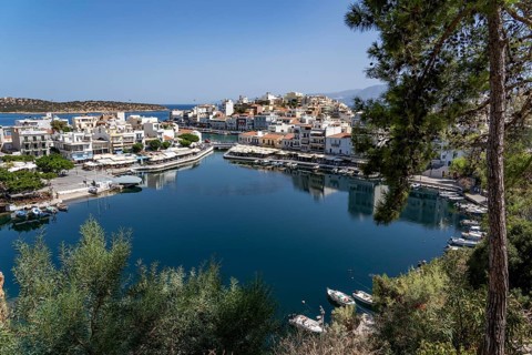 The village of Agios Nikolaos, in the eastern part of Crete, view over Lake Voulismeni, connected