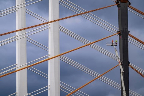 The new Rhine bridge Neuenkamp, the A40, white pillar ropes, and the old motorway bridge, which is