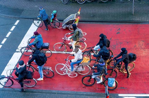 Cycle lane, space for cyclists at a traffic light crossing, marked red, cars, lorries must stop