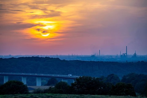 Sunset over the western Ruhr area, Ruhr valley bridge of the A52 motorway between Essen and