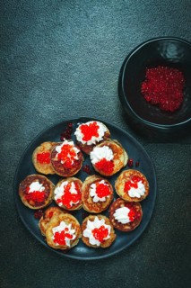 Demidoff pancakes, mini pancakes, with sour cream and red caviar, homemade, no people