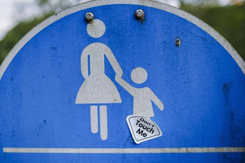 Symbolic photo on the subject of sexual abuse of children. A sticker with the inscription 'Äô