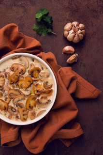 Champignons in creamy garlic sauce, with herbs and spices, gravy, sauce, no people