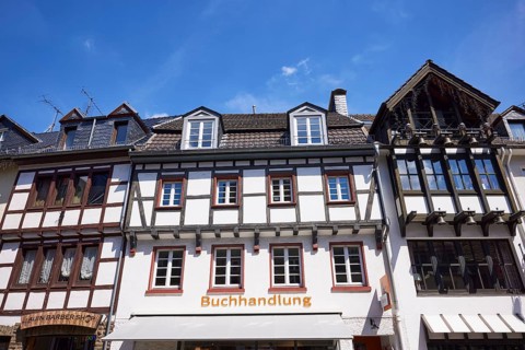 Library and barbershop on Marktstraße in Bad Münstereifel, Eifel, Euskirchen district, North