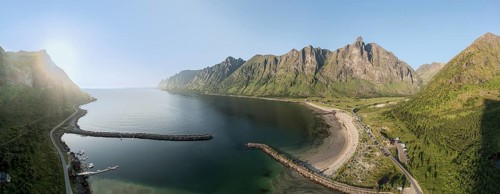 Panoramic aerial view of campsite at beach Ersfjordstranden, fjord Ersfjord, golden restroom, Senja