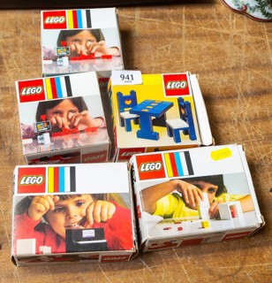 Boxes of Lego toys on display in auction room, UK