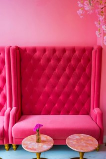 Vintage decoration in pink with plush sofa and table as furnishing, interior, design, upholstery,