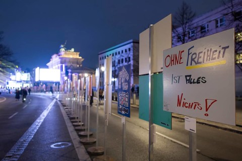 Signs painted by children with, among other things, the inscription Without freedom everything is