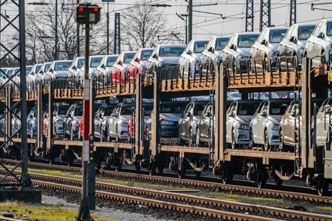 VW plant, Emden, new cars, car transporter, car train, goods train, with VW vehicles, Lower Saxony,