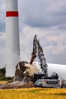 Demolished tower of a 20 year old wind turbine, in the Werl wind farm, 5 old Enercon E-66 turbines