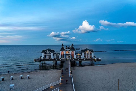 The pier of Sellin, evening mood, sunset, 394 metres long, with restaurant, jetty, beach chairs,