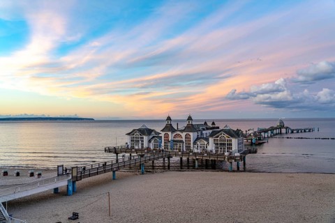The pier of Sellin, evening mood, sunset, 394 metres long, with restaurant, jetty, beach chairs,