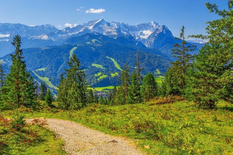 Hiking trail on the Wank 1780m with views of the valley and Zugspitze group 2962m,