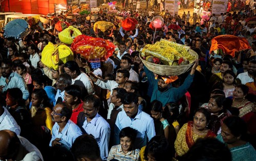 Hindu devotees crowd to perform rituals to the Sun god in the bank of Brahmaputra river on the