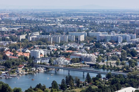 Panorama of a city with river, bridges and residential buildings, Vienna