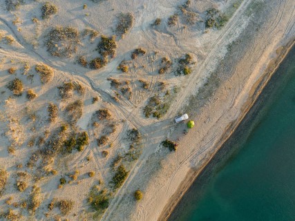 Top-Down, Camping with car, Aerial view, Landscape at Lake Issyk Kul, Kyrgyzstan, Asia