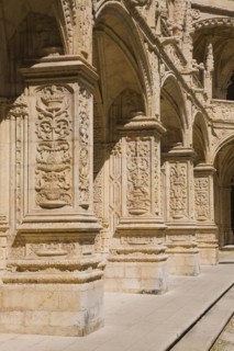 Old building with columns and arches decorated with architectural details in the inner courtyard at