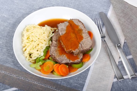 Swabian cuisine, roast beef, roast ox, herb spaetzle, meat dish, gravy, carrot vegetables, leek,