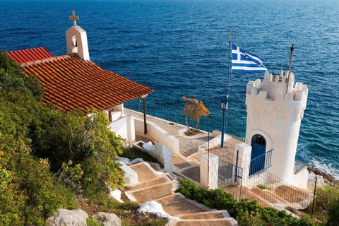Small chapel with Greek flag and sea view, Church of Agios Nikolaos Krasoktistos, Agia Kyriaki,