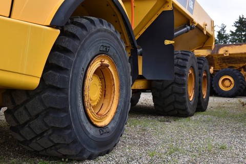Car tyres from a dump truck
