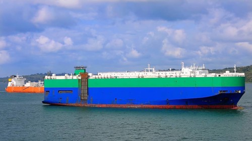 International container ship crossing Panama Canal delivering global commerce trade cargo