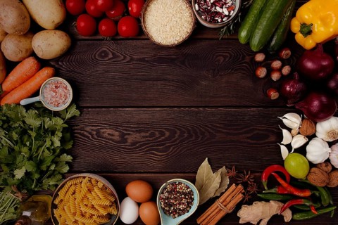 Assortment of ingredients and spices, for cooking, on a wooden background, concept, top view, food