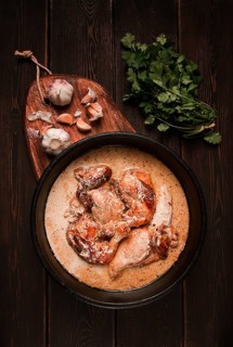 Shkmeruli, fried chicken, in milk-garlic sauce, Georgian cuisine, homemade, close-up, no people