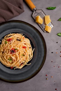 Pasta with tomato sauce and cheese, Italian traditional dish, close-up, no people