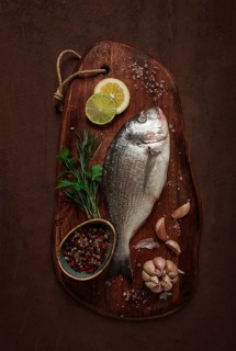 Fresh, raw dorado fish, top view, no people