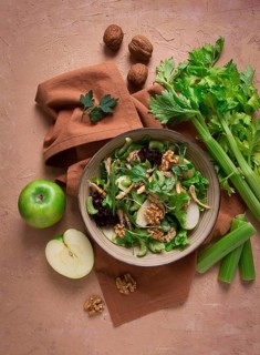 Fresh, Waldorf salad, celery stalk with chicken, apple and walnut, grapes, herbs, homemade, no