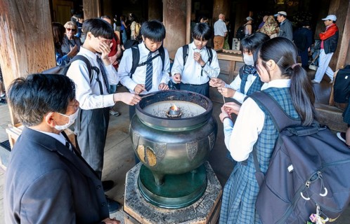 Group of Japanese students at Kiyomizu-dera temple, Kyoto, Japan, Asia