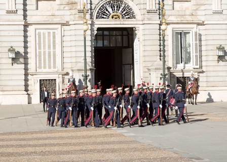 Marching soldiers in traditional dress uniform, Palacio Real royal palace, Madrid, Spain, Europe