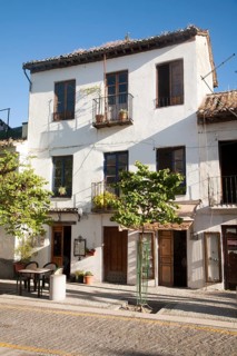 Building in historic square Placeta de San Miguel Bajo in the Albaicin district, Granada, Spain,