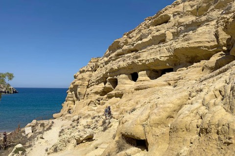 Partial view of former Roman necropolis with cave dwelling tombs carved in sandstone Grottoes in