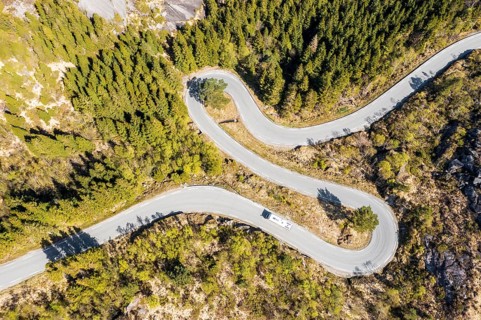 Aerial view of mountain road fv 44 west of Flekkefjord, camper van, norwegian southern coast,