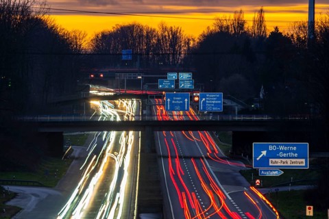 Motorway A40, Ruhrschnellweg, near Bochum, dense evening traffic, in front of the motorway junction