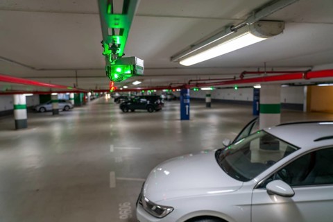 Underground car parks, multi-storey car parks, red or green lamps on the ceiling, show drivers