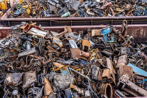 Push barge, loaded with scrap metal, for recycling, melting down, in the harbour canal,