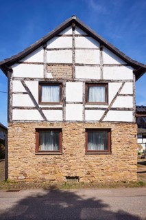 Half-timbered house on a sandstone plinth in the district of Pesch, Nettersheim, Eifel, Euskirchen