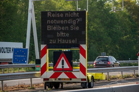 German-Dutch border at Emmerich-Elten, A3 motorway, signal board asks travellers to only make