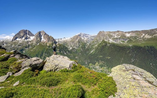 Mountaineer in front of a mountain panorama, Aiguille de Mesure and Aiguille de Chamois, hike to