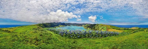 360° panorama of the Caldeira das Sete Cidades with the crater lake Lagoa Azul and blue horternsia