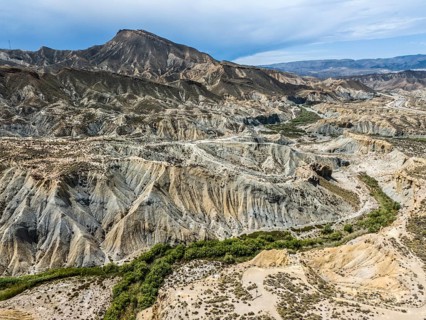 Barren mountain slopes and valleys with rugged, dry landscape, aerial view, Tabernas Desert,