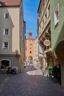 View of the Brückstraße and the Brückturm in the historic city of Regensburg, Bavaria Germany